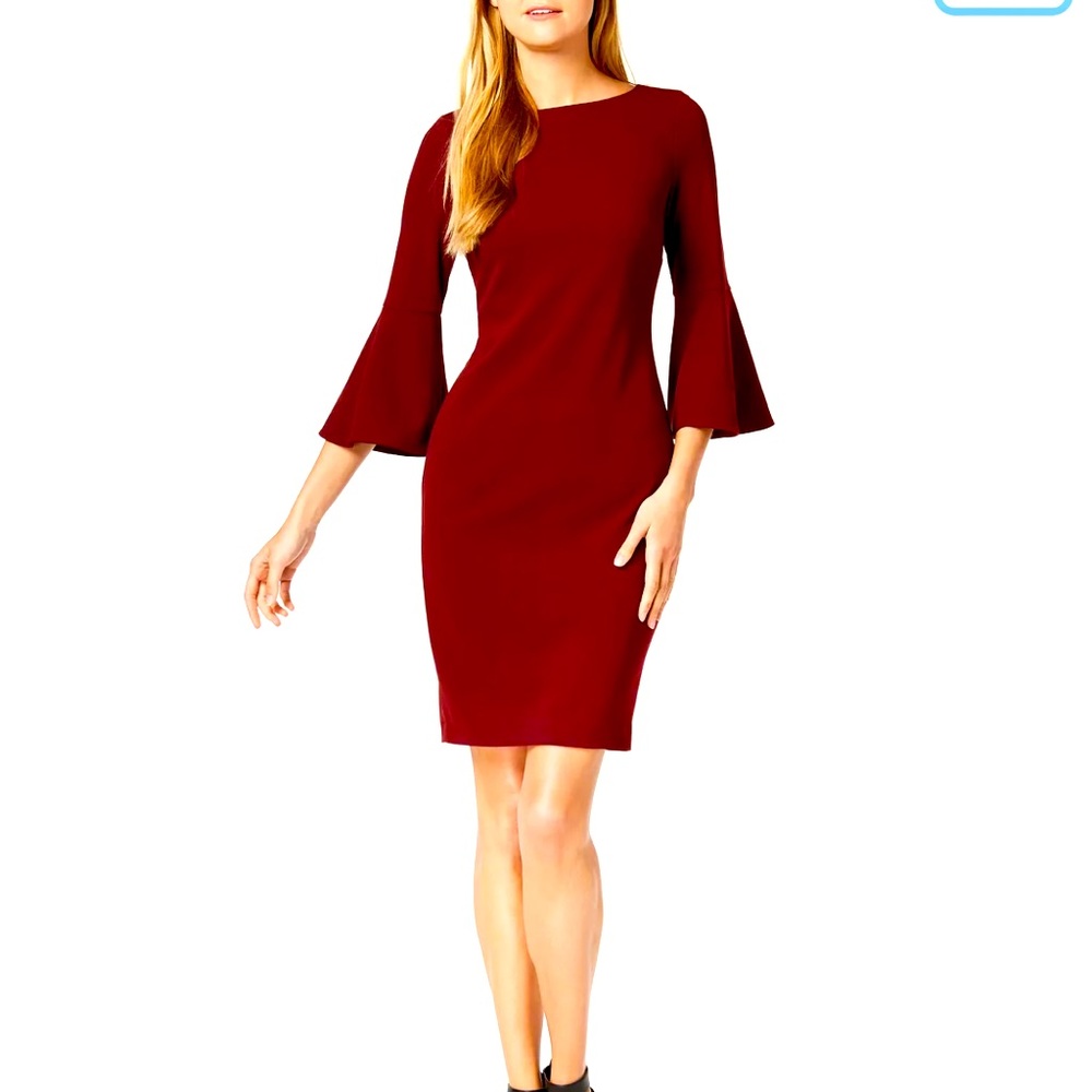 Calvin Klein dress beautiful fitted dress. Worn 1 time only.  Bell sleeves.